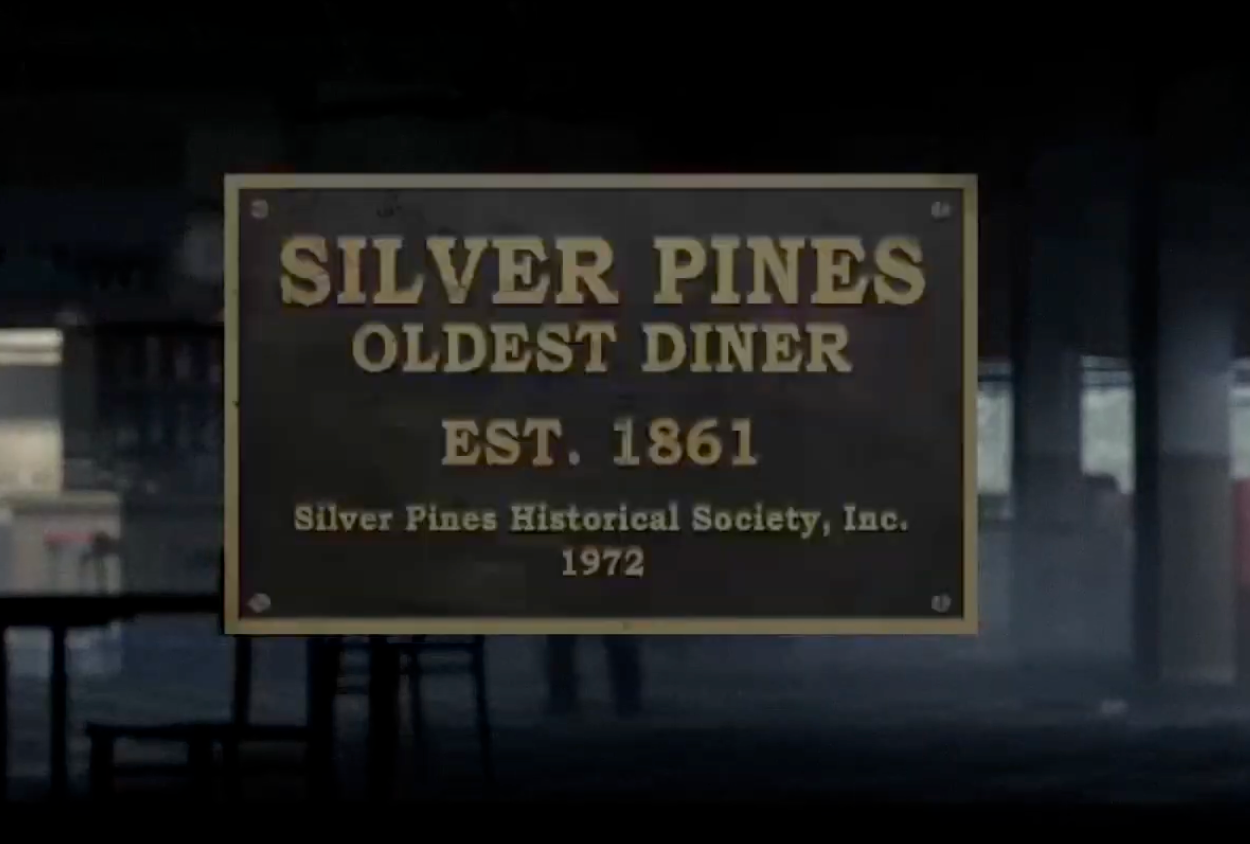The memorial plaque inside the Silver Pines diner.